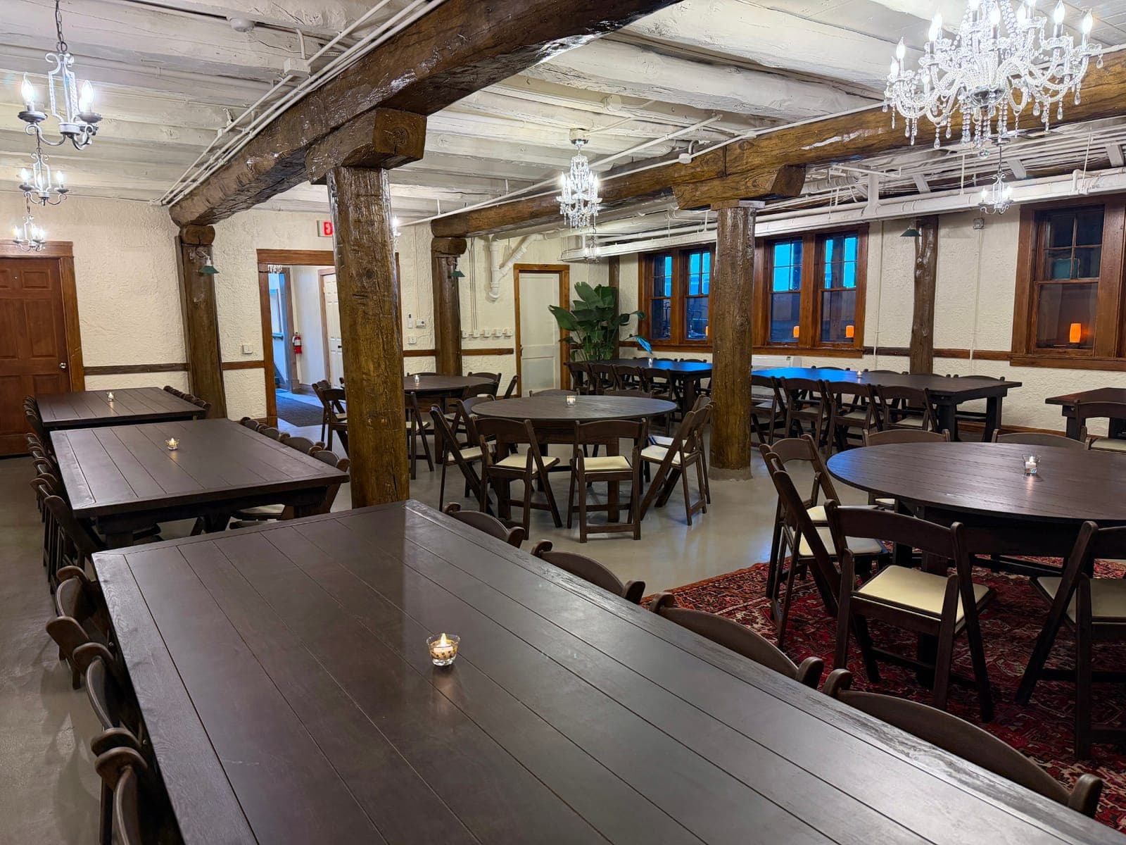 Tables set for an event in the Tamarack Room